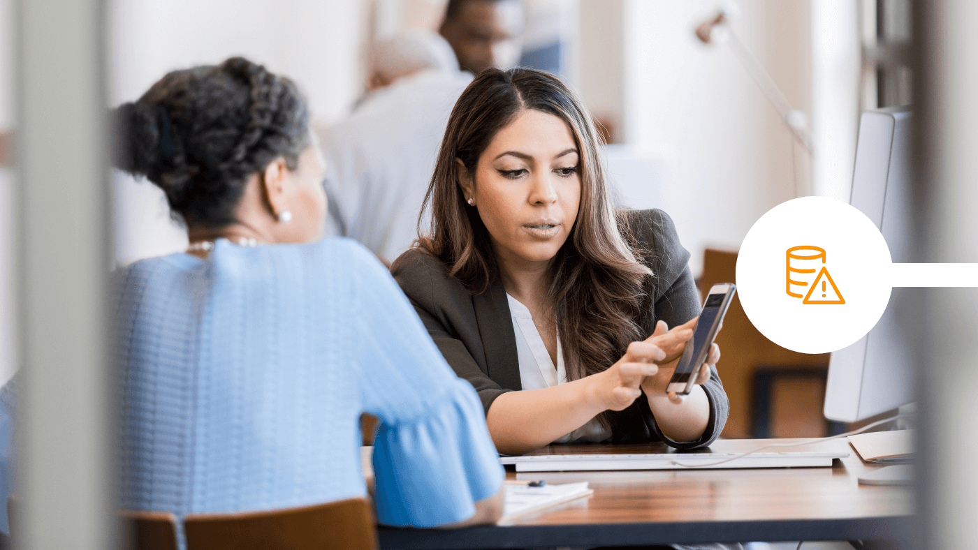 Banking adviser showing customer their smart phone