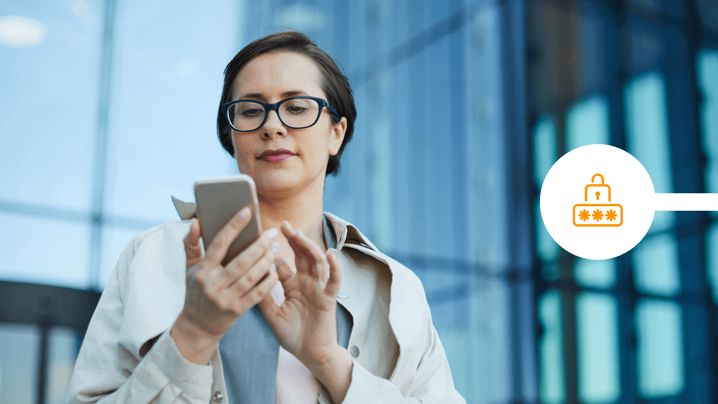 Female professional using TLS encryption on her smartphone outside the building