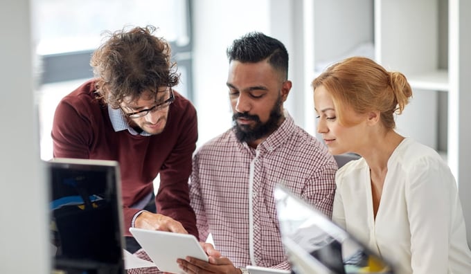 IT colleagues assessing email security technology