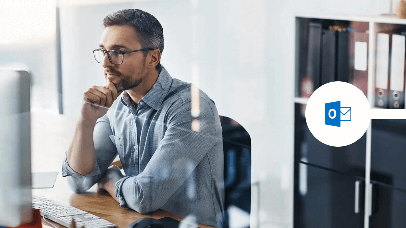 Man securing an email in Mailock for Outlook in office