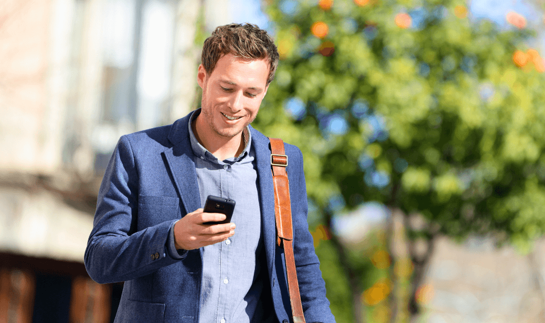 Man sending document by email on his phone