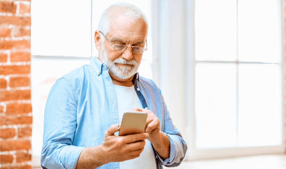 Older man sending asylum document by email