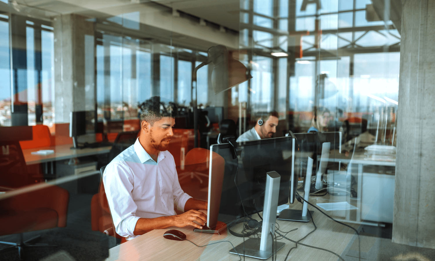 People in contact centre using computers