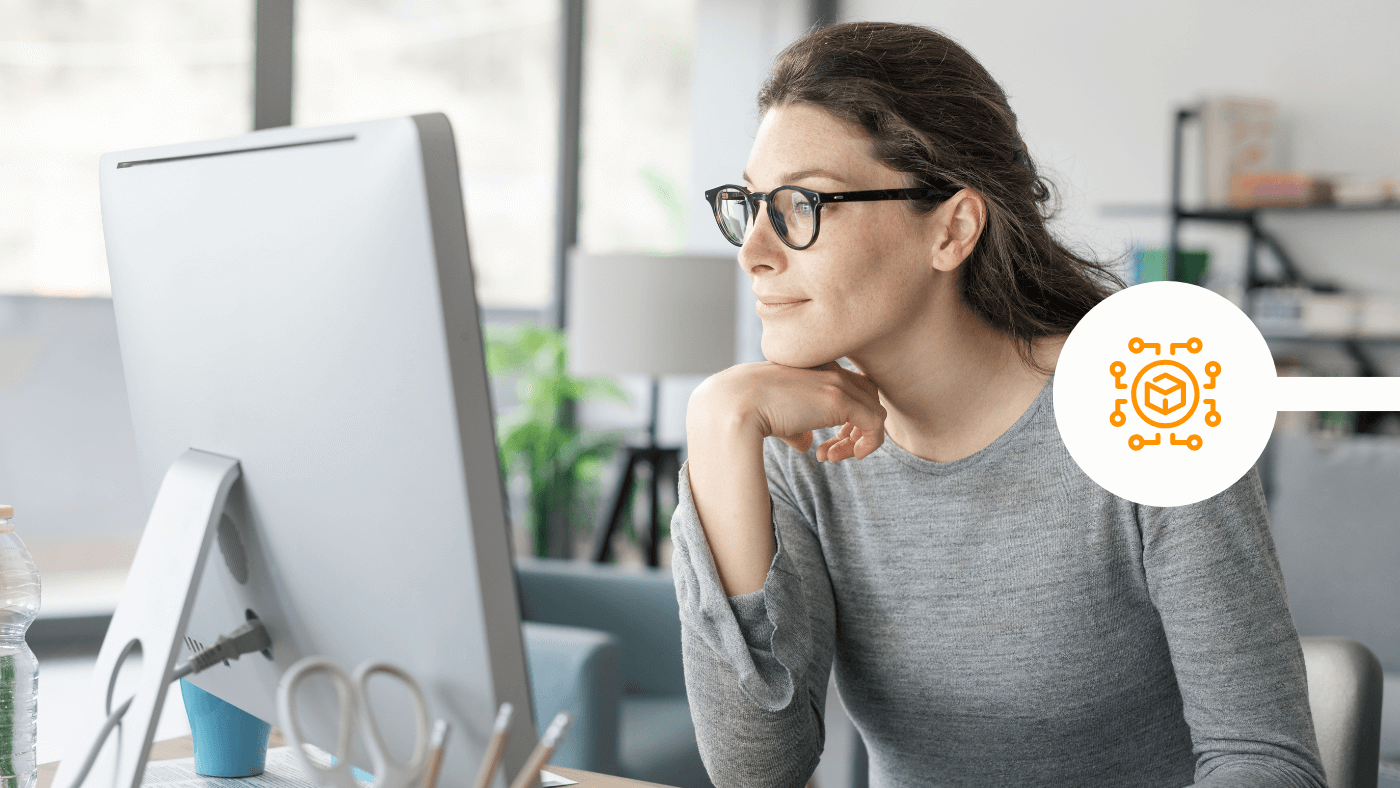 Professional woman working in home office on desktop computer