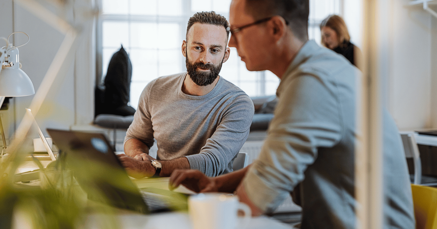 man explaining secure email to colleague