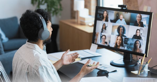 Man on video conference call for work in home office